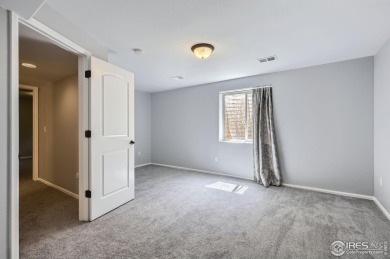 This beautiful 2-story home is situated on a spacious, 11,134 on Pelican Lakes Golf and Country Club in Colorado - for sale on GolfHomes.com, golf home, golf lot