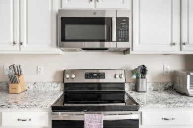 Rare chance to own one of only 12 walkout end units at Mariners on Mariners Landing Golf and Country Club in Virginia - for sale on GolfHomes.com, golf home, golf lot