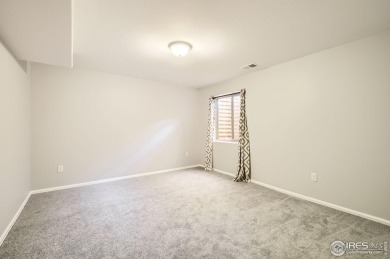 This beautiful 2-story home is situated on a spacious, 11,134 on Pelican Lakes Golf and Country Club in Colorado - for sale on GolfHomes.com, golf home, golf lot