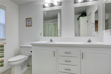 Live the Barefoot Bay lifestyle in this beautifully landscaped on Barefoot Bay Golf Course in Florida - for sale on GolfHomes.com, golf home, golf lot