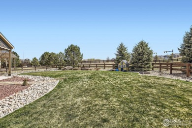 This beautiful 2-story home is situated on a spacious, 11,134 on Pelican Lakes Golf and Country Club in Colorado - for sale on GolfHomes.com, golf home, golf lot