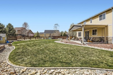 This beautiful 2-story home is situated on a spacious, 11,134 on Pelican Lakes Golf and Country Club in Colorado - for sale on GolfHomes.com, golf home, golf lot