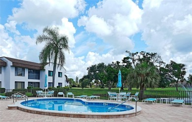 Welcome to Summer Green! This stunning, cozy 2bed/2bath second on Capri Isle Golf Club in Florida - for sale on GolfHomes.com, golf home, golf lot