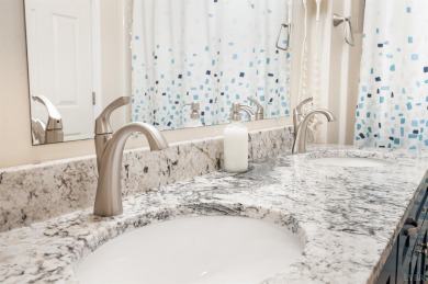Rare chance to own one of only 12 walkout end units at Mariners on Mariners Landing Golf and Country Club in Virginia - for sale on GolfHomes.com, golf home, golf lot