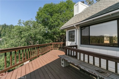 Level entry to a two-car garage mountain home with 3 bedrooms on Lake Arrowhead Country Club in California - for sale on GolfHomes.com, golf home, golf lot