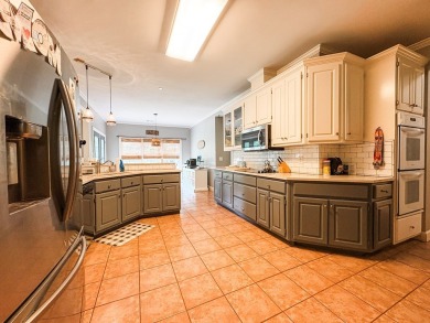 Welcome to 4880 Turnberry Lane - a Southern charmer with on Maple Ridge Golf Club in Georgia - for sale on GolfHomes.com, golf home, golf lot