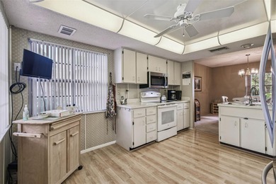 Welcome to this beautifully maintained 3-bedroom, 2-bath on Beacon Woods Golf Club in Florida - for sale on GolfHomes.com, golf home, golf lot