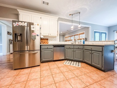 Welcome to 4880 Turnberry Lane - a Southern charmer with on Maple Ridge Golf Club in Georgia - for sale on GolfHomes.com, golf home, golf lot
