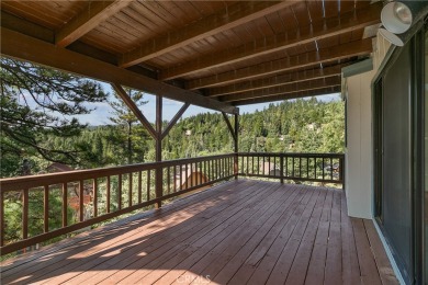 Level entry to a two-car garage mountain home with 3 bedrooms on Lake Arrowhead Country Club in California - for sale on GolfHomes.com, golf home, golf lot