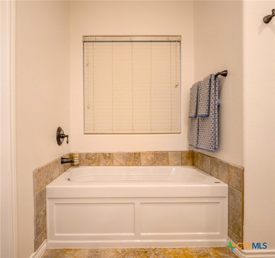 Welcome to this recently refreshed 3-bedroom, 2-bath brick home on Hidden Falls Golf Club in Texas - for sale on GolfHomes.com, golf home, golf lot