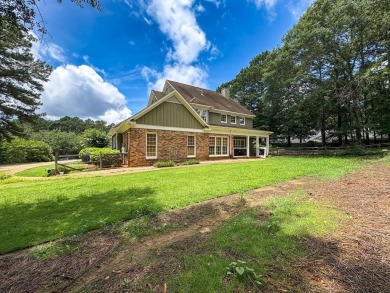 Welcome to 4880 Turnberry Lane - a Southern charmer with on Maple Ridge Golf Club in Georgia - for sale on GolfHomes.com, golf home, golf lot