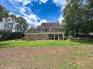 Welcome to 4880 Turnberry Lane - a Southern charmer with on Maple Ridge Golf Club in Georgia - for sale on GolfHomes.com, golf home, golf lot