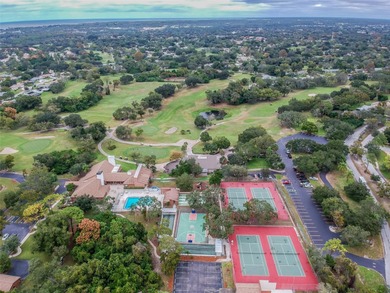 Welcome to this beautifully maintained 3-bedroom, 2-bath on Beacon Woods Golf Club in Florida - for sale on GolfHomes.com, golf home, golf lot
