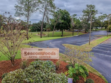 Welcome to this beautifully maintained 3-bedroom, 2-bath on Beacon Woods Golf Club in Florida - for sale on GolfHomes.com, golf home, golf lot