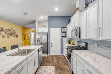 Welcome to Your Perfect Florida Retreat! Step into this on Grand Reserve Golf Course in Florida - for sale on GolfHomes.com, golf home, golf lot