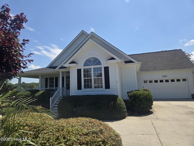 This charming farmhouse-style home with wraparound porches on Ocean Ridge Plantation in North Carolina - for sale on GolfHomes.com, golf home, golf lot