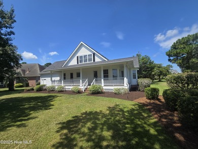This charming farmhouse-style home with wraparound porches on Ocean Ridge Plantation in North Carolina - for sale on GolfHomes.com, golf home, golf lot