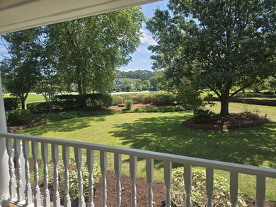 This charming farmhouse-style home with wraparound porches on Ocean Ridge Plantation in North Carolina - for sale on GolfHomes.com, golf home, golf lot