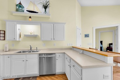 Light-filled, airy, and designed for easy coastal living, this on Harbour Point Golf Club in North Carolina - for sale on GolfHomes.com, golf home, golf lot