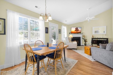 Light-filled, airy, and designed for easy coastal living, this on Harbour Point Golf Club in North Carolina - for sale on GolfHomes.com, golf home, golf lot