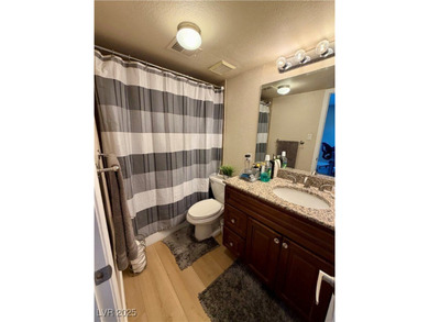 Welcome to Las Vegas Country Club.  Enter through a 24-hour on Las Vegas Country Club in Nevada - for sale on GolfHomes.com, golf home, golf lot