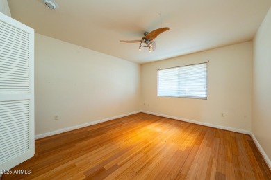 This spacious 3-bedroom, 2-bath residence offers 1,832 sq ft of on PalmBrook Country Club in Arizona - for sale on GolfHomes.com, golf home, golf lot