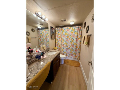 Welcome to Las Vegas Country Club.  Enter through a 24-hour on Las Vegas Country Club in Nevada - for sale on GolfHomes.com, golf home, golf lot