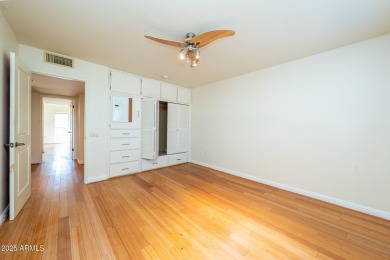 This spacious 3-bedroom, 2-bath residence offers 1,832 sq ft of on PalmBrook Country Club in Arizona - for sale on GolfHomes.com, golf home, golf lot