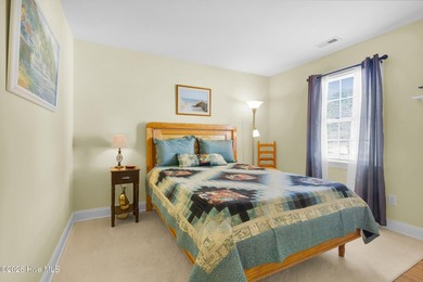 Light-filled, airy, and designed for easy coastal living, this on Harbour Point Golf Club in North Carolina - for sale on GolfHomes.com, golf home, golf lot