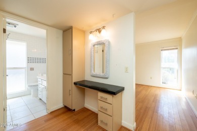 This spacious 3-bedroom, 2-bath residence offers 1,832 sq ft of on PalmBrook Country Club in Arizona - for sale on GolfHomes.com, golf home, golf lot