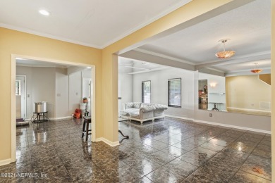 Stunning estate home on an acre (.97). This home has WOW factor on Hidden Hills Country Club in Florida - for sale on GolfHomes.com, golf home, golf lot