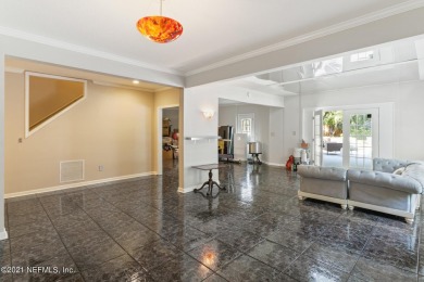 Stunning estate home on an acre (.97). This home has WOW factor on Hidden Hills Country Club in Florida - for sale on GolfHomes.com, golf home, golf lot