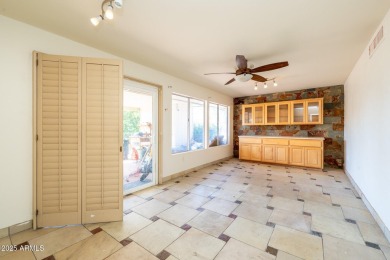 This spacious 3-bedroom, 2-bath residence offers 1,832 sq ft of on PalmBrook Country Club in Arizona - for sale on GolfHomes.com, golf home, golf lot