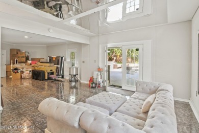 Stunning estate home on an acre (.97). This home has WOW factor on Hidden Hills Country Club in Florida - for sale on GolfHomes.com, golf home, golf lot