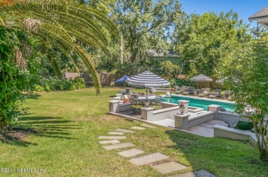 Stunning estate home on an acre (.97). This home has WOW factor on Hidden Hills Country Club in Florida - for sale on GolfHomes.com, golf home, golf lot