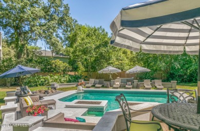 Stunning estate home on an acre (.97). This home has WOW factor on Hidden Hills Country Club in Florida - for sale on GolfHomes.com, golf home, golf lot