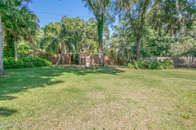 Stunning estate home on an acre (.97). This home has WOW factor on Hidden Hills Country Club in Florida - for sale on GolfHomes.com, golf home, golf lot