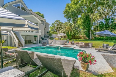 Stunning estate home on an acre (.97). This home has WOW factor on Hidden Hills Country Club in Florida - for sale on GolfHomes.com, golf home, golf lot