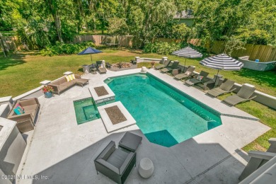 Stunning estate home on an acre (.97). This home has WOW factor on Hidden Hills Country Club in Florida - for sale on GolfHomes.com, golf home, golf lot