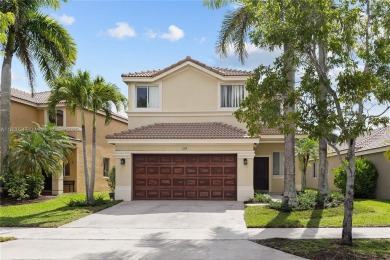 Beautifully maintained 5 bed, 2.5 bath home in the guard-gated on Weston Hills Country Club in Florida - for sale on GolfHomes.com, golf home, golf lot