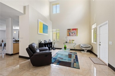 Beautifully maintained 5 bed, 2.5 bath home in the guard-gated on Weston Hills Country Club in Florida - for sale on GolfHomes.com, golf home, golf lot