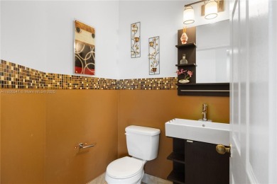 Beautifully maintained 5 bed, 2.5 bath home in the guard-gated on Weston Hills Country Club in Florida - for sale on GolfHomes.com, golf home, golf lot