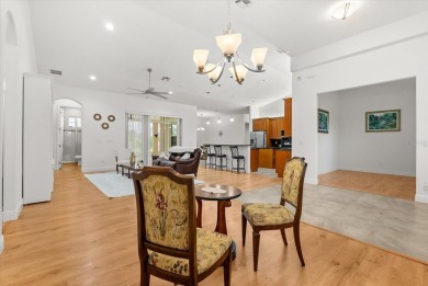 A RARE FIND! Welcome to a rare solar-powered retreat in the on Wedgefield Golf Club in Florida - for sale on GolfHomes.com, golf home, golf lot