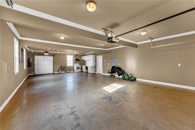 Stunning two-level home in a desirable Springdale location with on Springdale Country Club in Arkansas - for sale on GolfHomes.com, golf home, golf lot