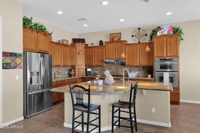 Experience the pinnacle of desert living in this impeccably on Estrella Mountain Ranch Golf Course in Arizona - for sale on GolfHomes.com, golf home, golf lot