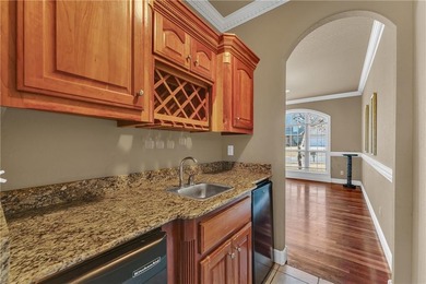 Stunning two-level home in a desirable Springdale location with on Springdale Country Club in Arkansas - for sale on GolfHomes.com, golf home, golf lot