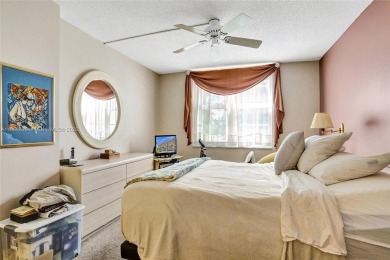 Experience Real South Florida Living in this spacious  2/2 condo on Jacaranda Golf Club in Florida - for sale on GolfHomes.com, golf home, golf lot