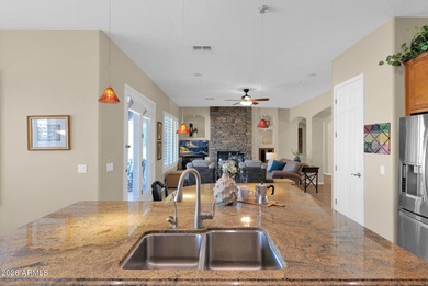 Experience the pinnacle of desert living in this impeccably on Estrella Mountain Ranch Golf Course in Arizona - for sale on GolfHomes.com, golf home, golf lot