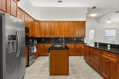 A RARE FIND! Welcome to a rare solar-powered retreat in the on Wedgefield Golf Club in Florida - for sale on GolfHomes.com, golf home, golf lot