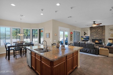 Experience the pinnacle of desert living in this impeccably on Estrella Mountain Ranch Golf Course in Arizona - for sale on GolfHomes.com, golf home, golf lot